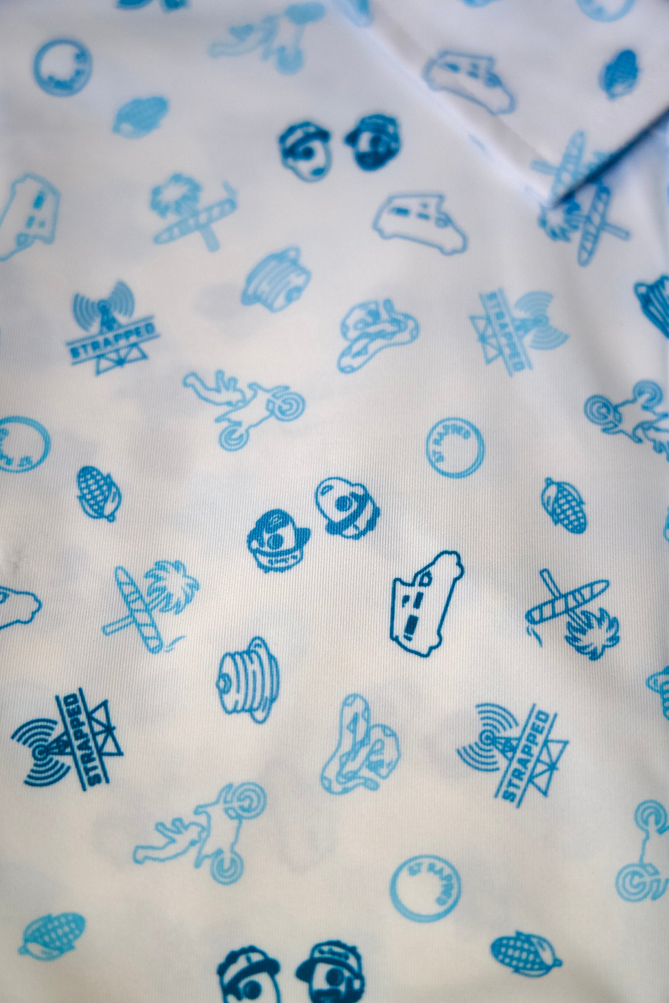 NLU x FJ Strapped Icons Printed Polo | White (Athletic Fit)